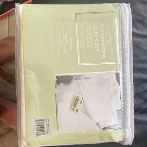 Queen set sheets - light beige.  Brand new.